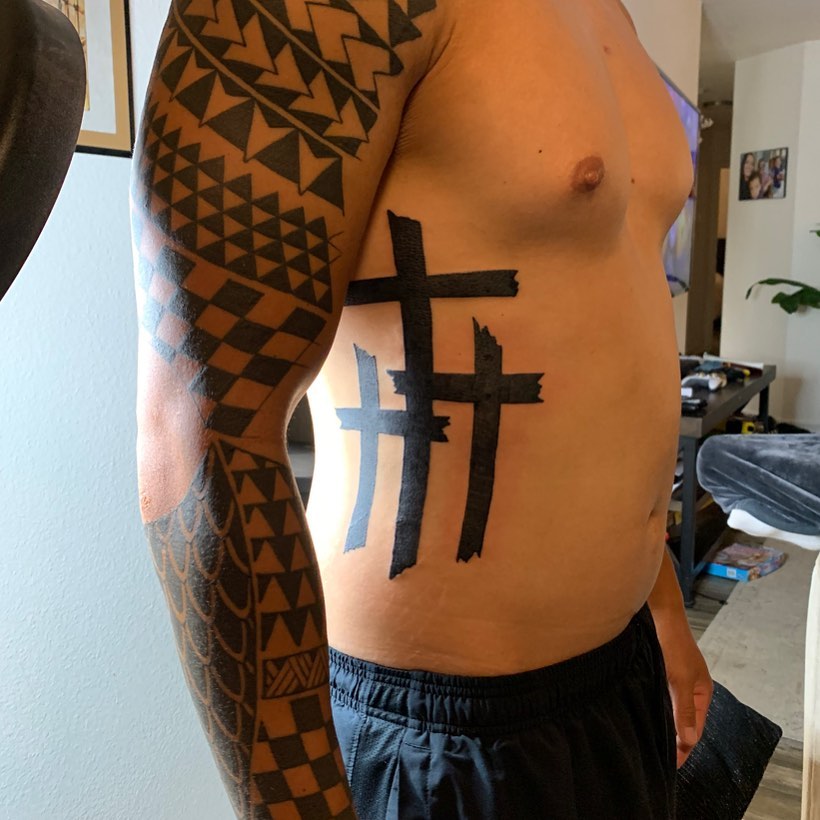 Cross Tattoo on Ribs