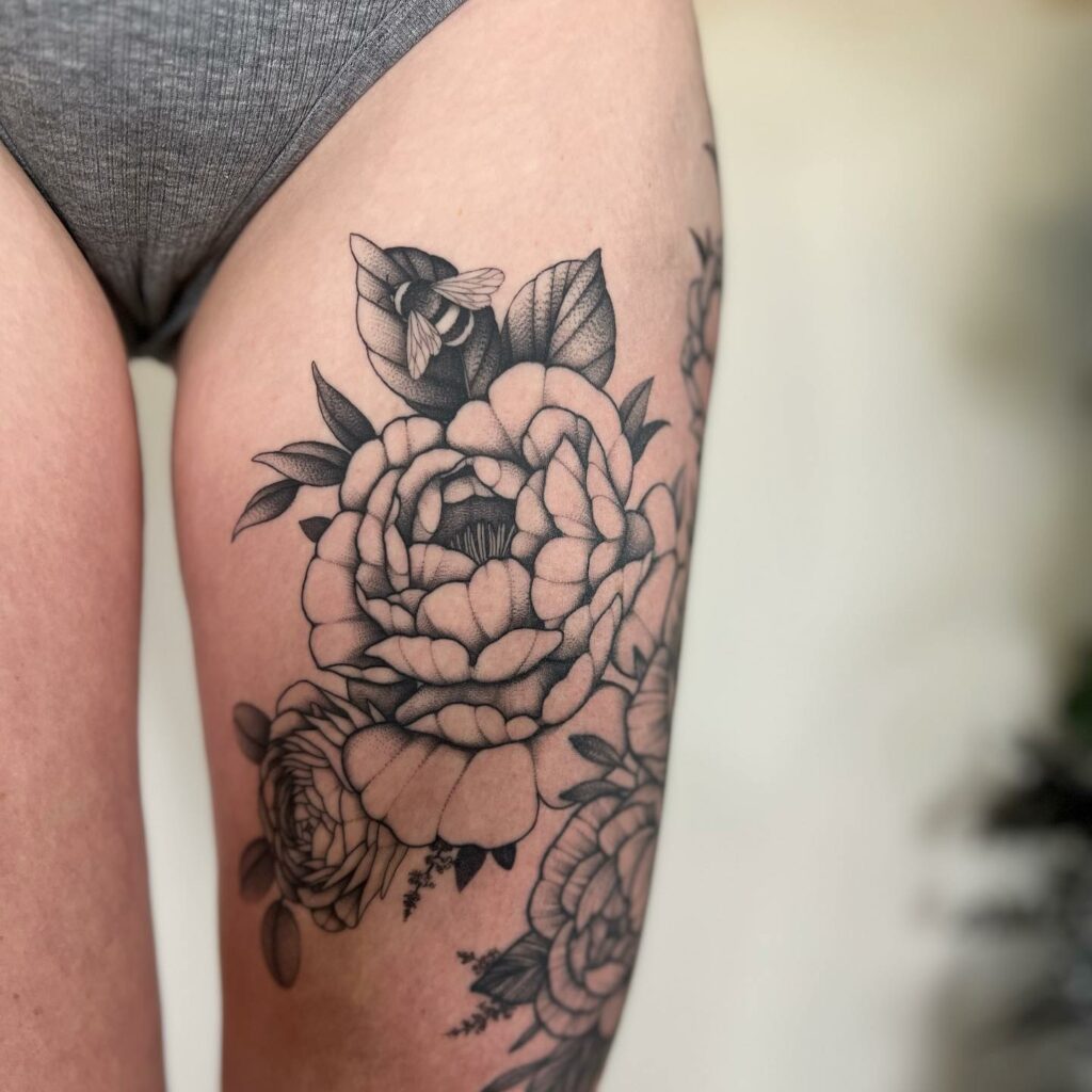 Women’s Thigh Tattoo