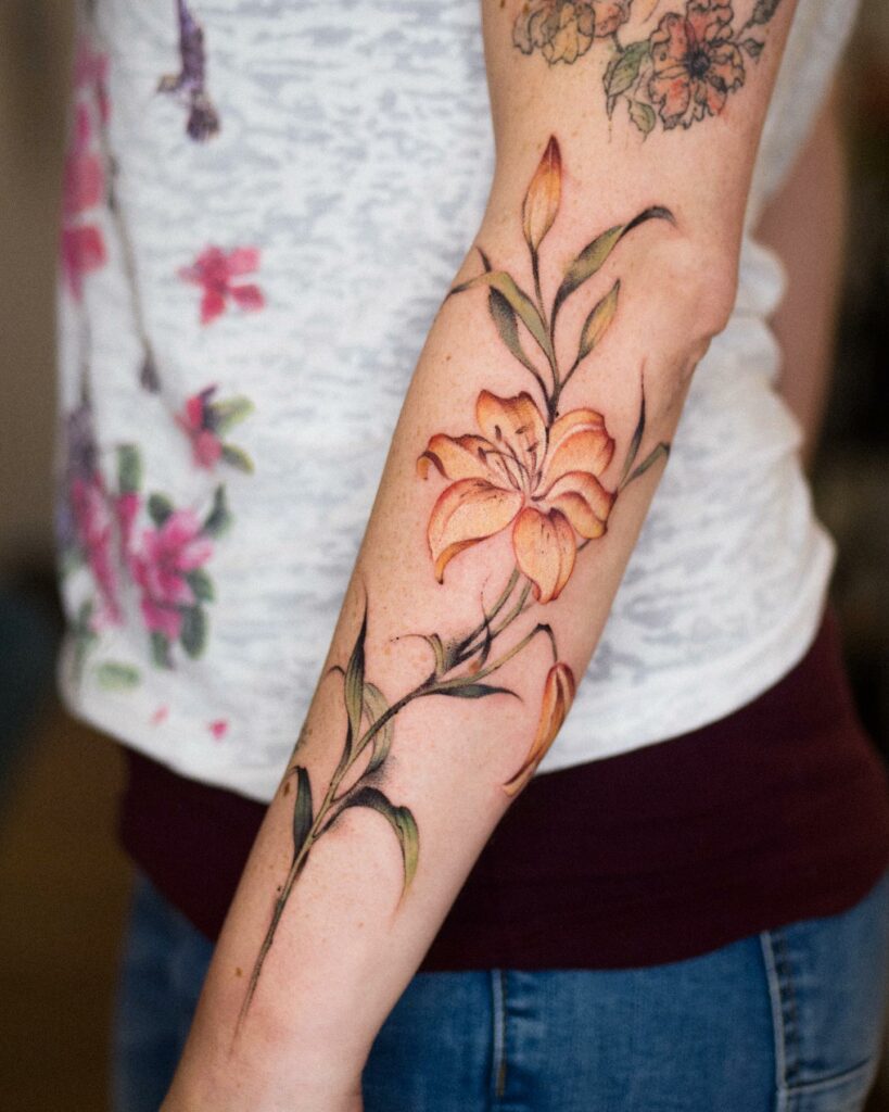 A tiny sunflower and breast  Iridescent Tattoo  Fine Art  Facebook