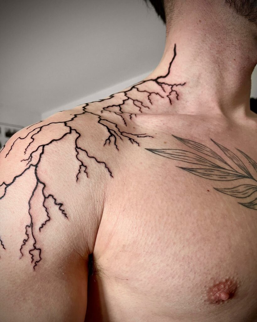 Hand and lightning bolt tattoo on the neck  Tattoogridnet