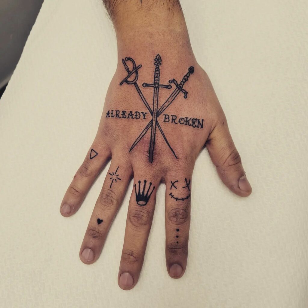 Hand and Finger Tattoo