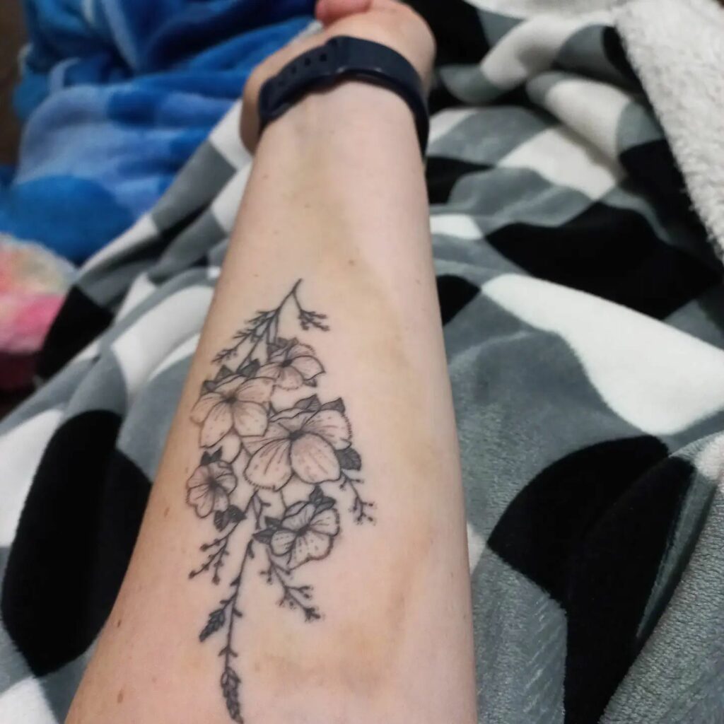 I got this tattoo over a month ago Can anyone tell me why its still  bruised  rtattoo
