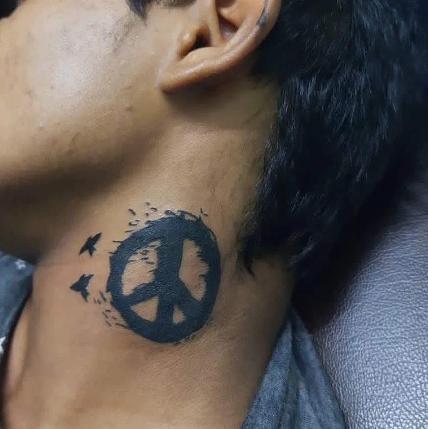37 Stunning Peace Sign Tattoo Ideas That You Will Love To Have  Psycho Tats