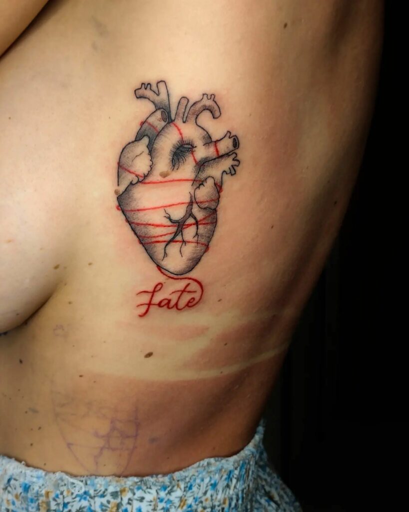 Heart side tattoo