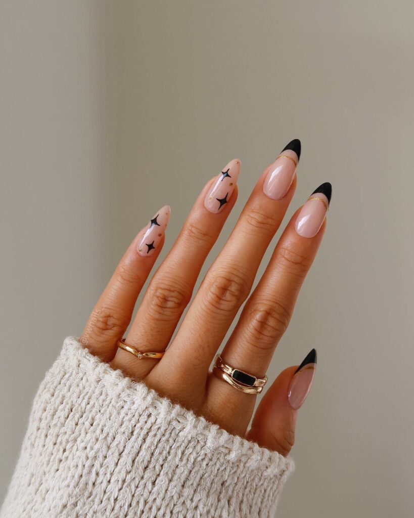 Almond Nails with Stars and Gold Stripes