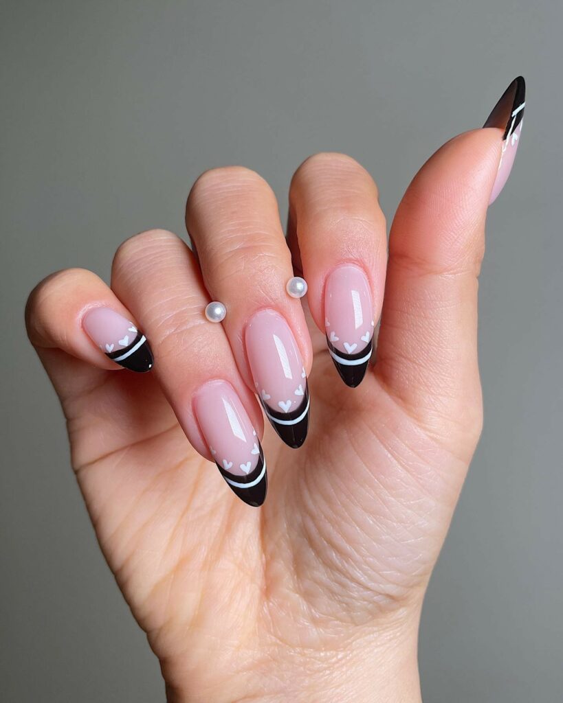 Black and White French Nails with Heart Accents