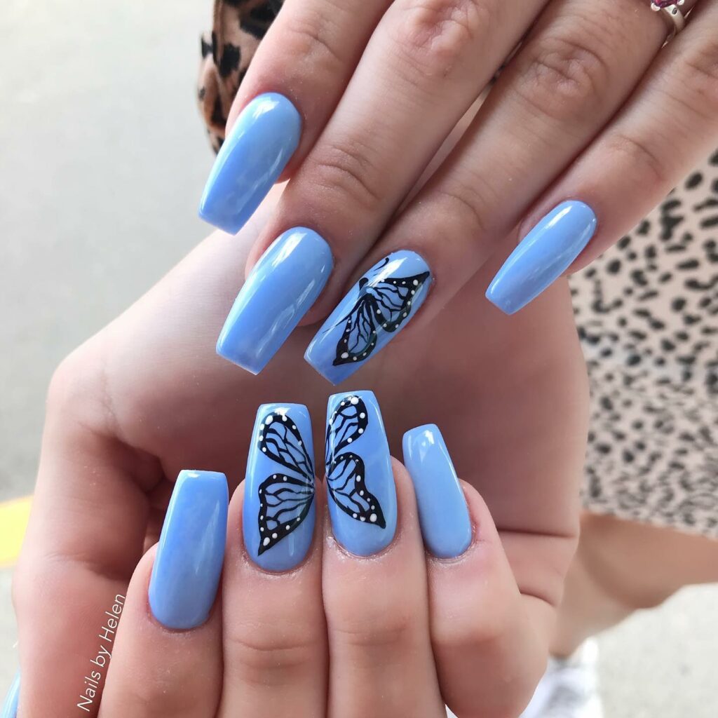 Blue Nails with Butterfly Accents