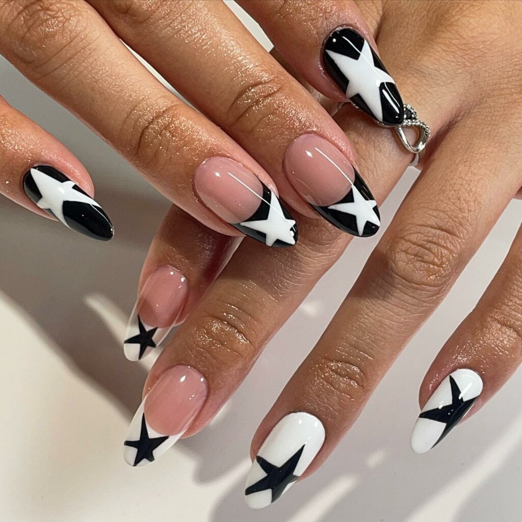 Black & White Nails with Starry Embellishments