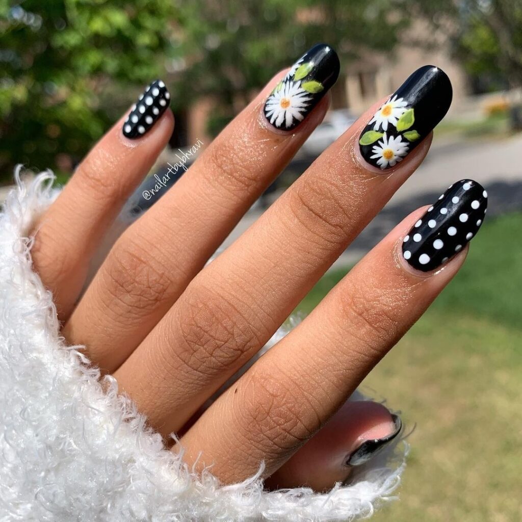 Black and White Nails with Delicate Floral Accents