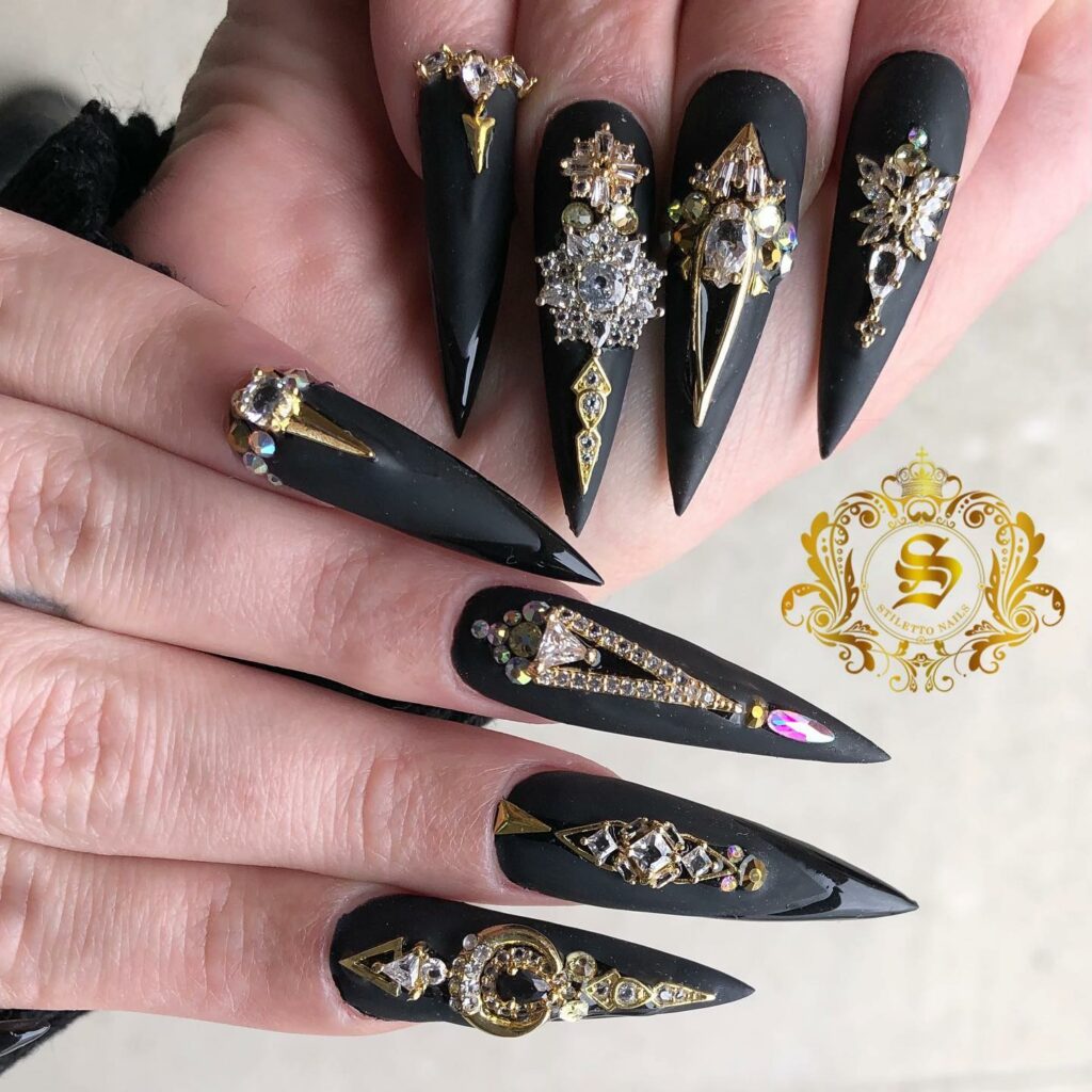 black and Gold Stiletto Nails