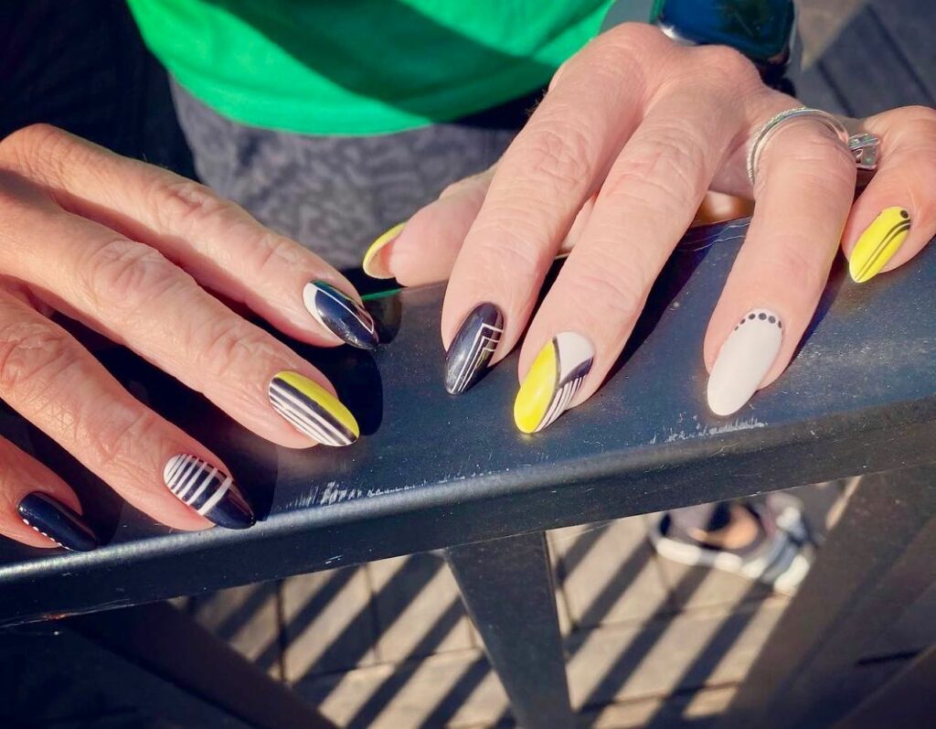 Bright Yellow Striped Nails