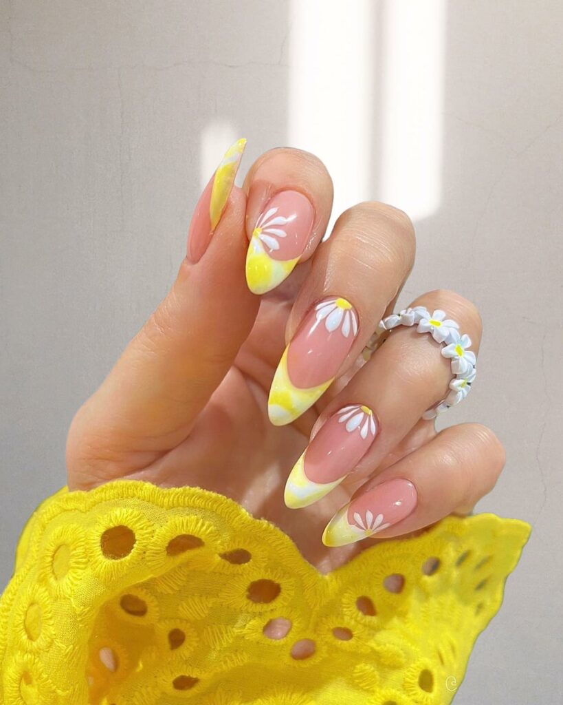 Daisy-Adorned French Yellow Nails