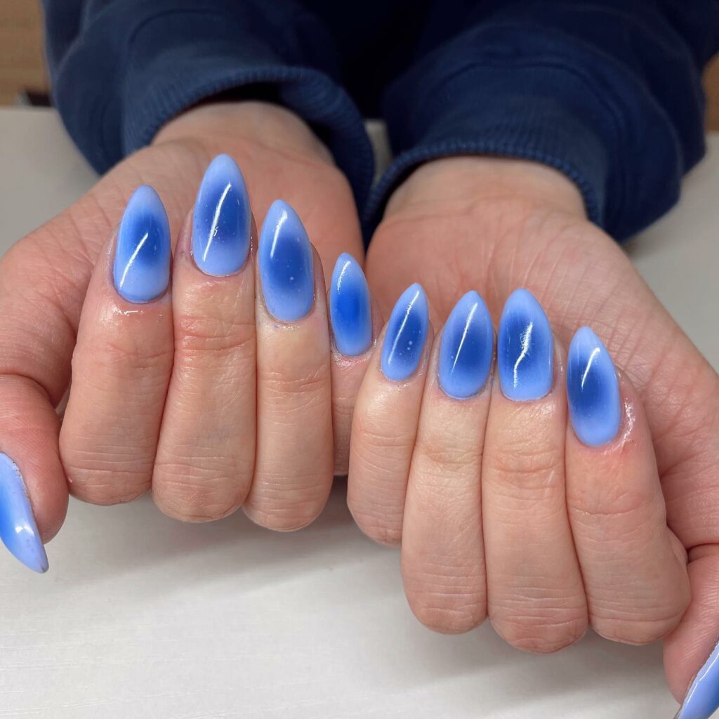 Airbrushed blue ombre nails