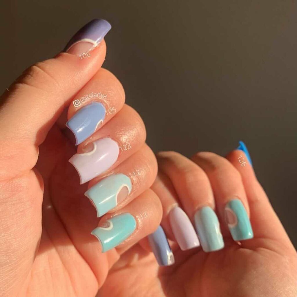 Blue Skittles nails