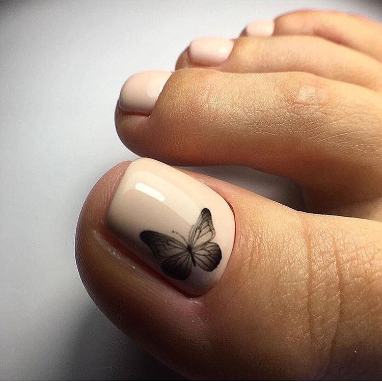Butterfly pedicure nails