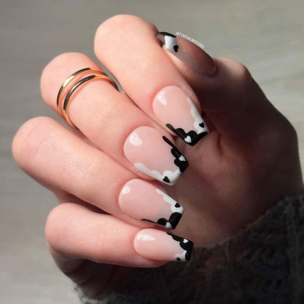 Cow Print Inspired Short Black French Nails 