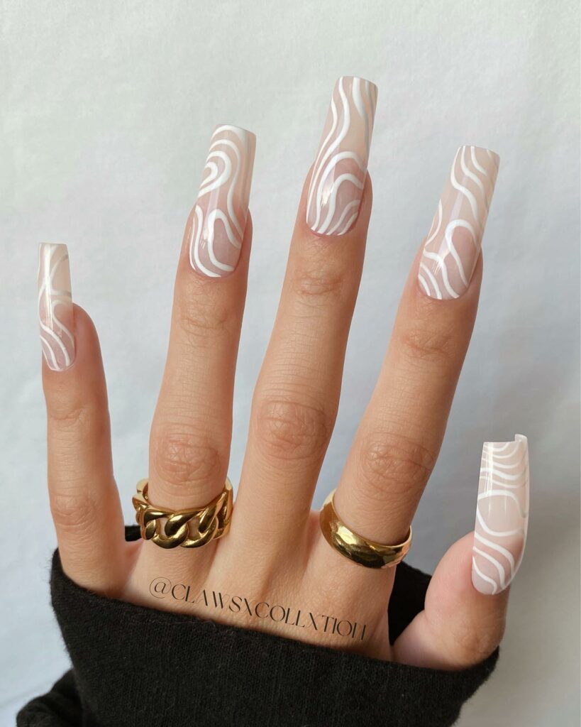 Long Nude and White Outline Nails