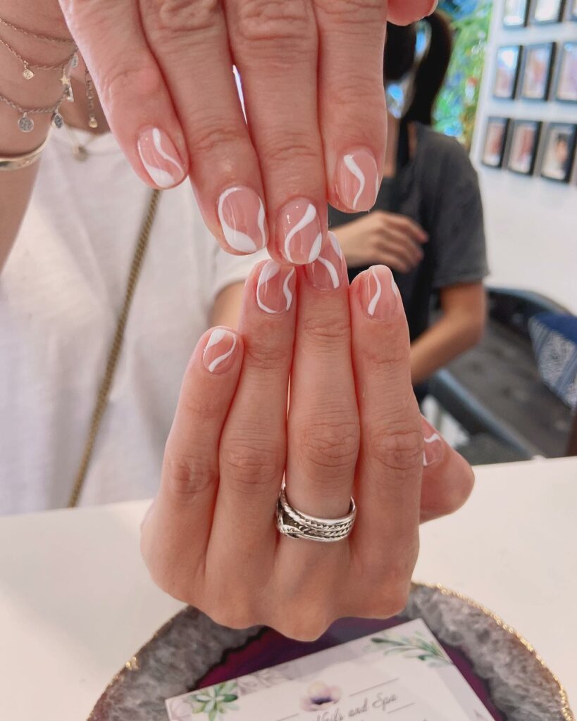Nude Nails With White Swirls instagram