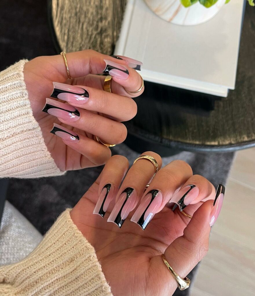Nude with Black Tips nails