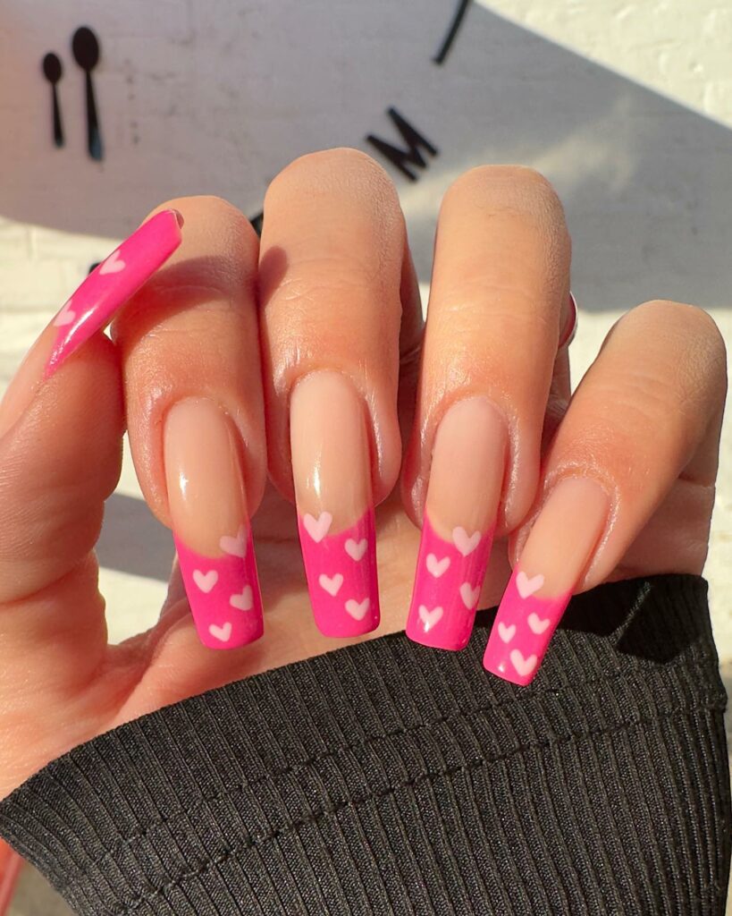 Hot Pink French Nails with Heart Motifs