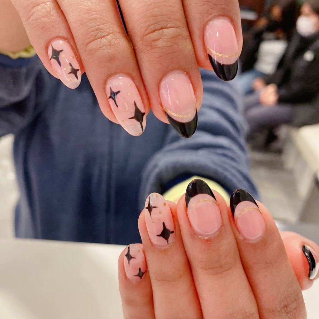 Short Black French Nails with a Modern Almond Shape