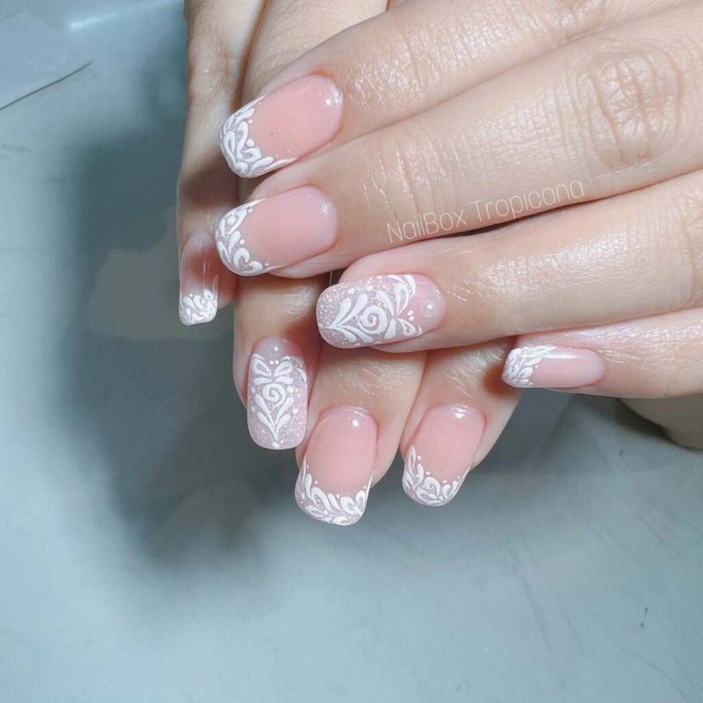 White Tips with Intricate Lace Designs