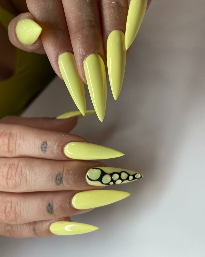Yellow Matte Stiletto nails