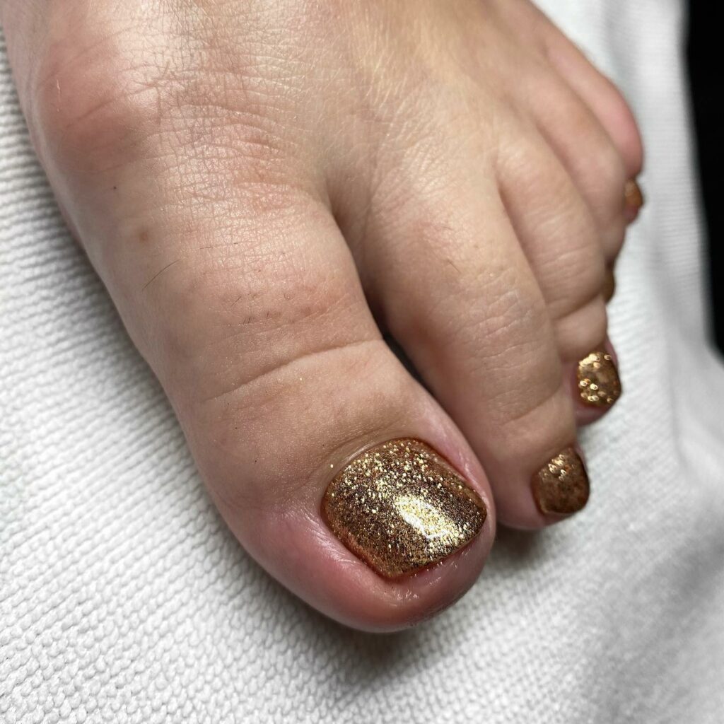 Sparkly Gold Nail Pedicure