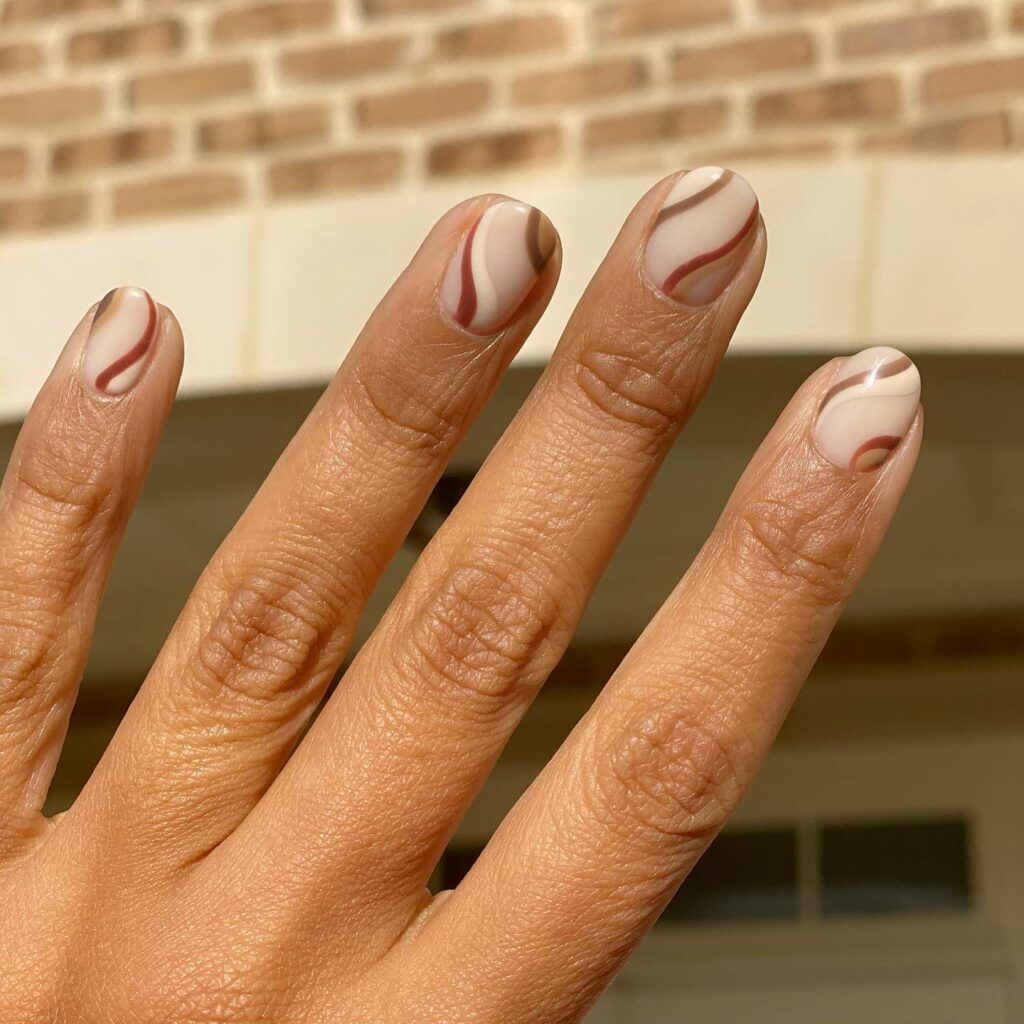 Beige And Brown Swirly Nails