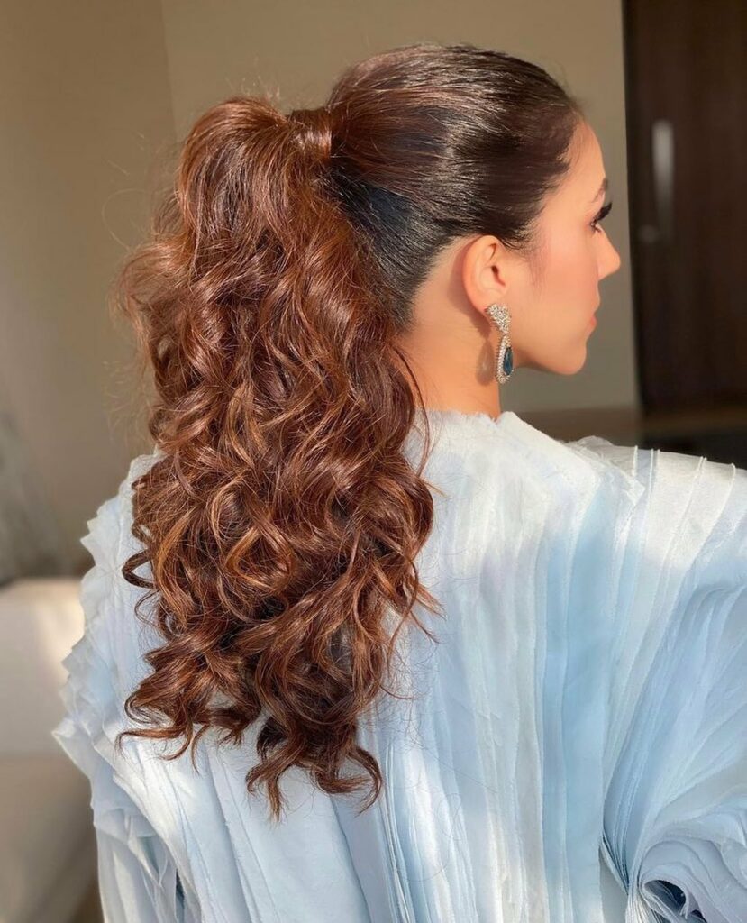 Glam Up With A Curly Ponytail