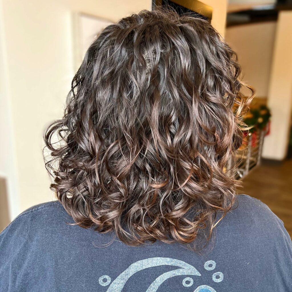 Medium Cut with Tousled Perm Curls