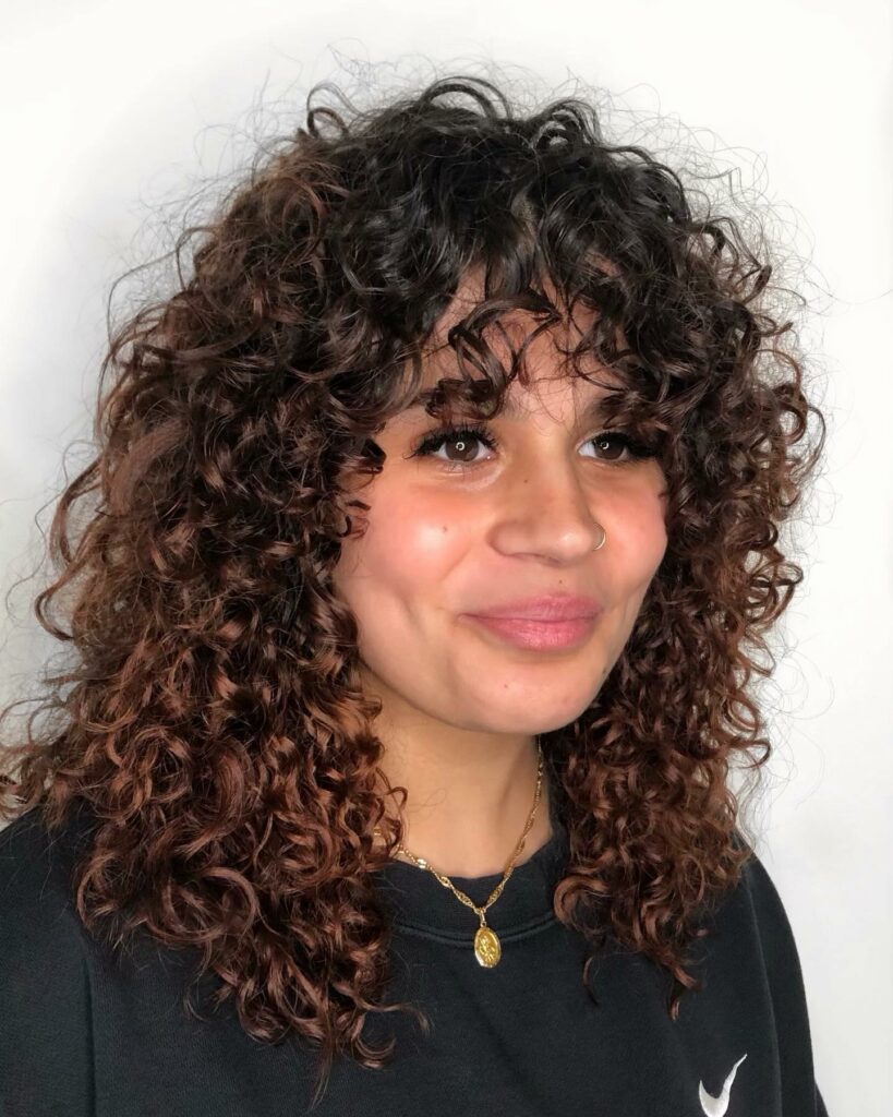 Spiral Perm Hairstyle with Bangs