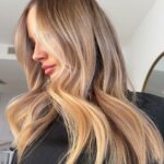 Dirty Blonde Hair with Bright Face-Framing Highlights