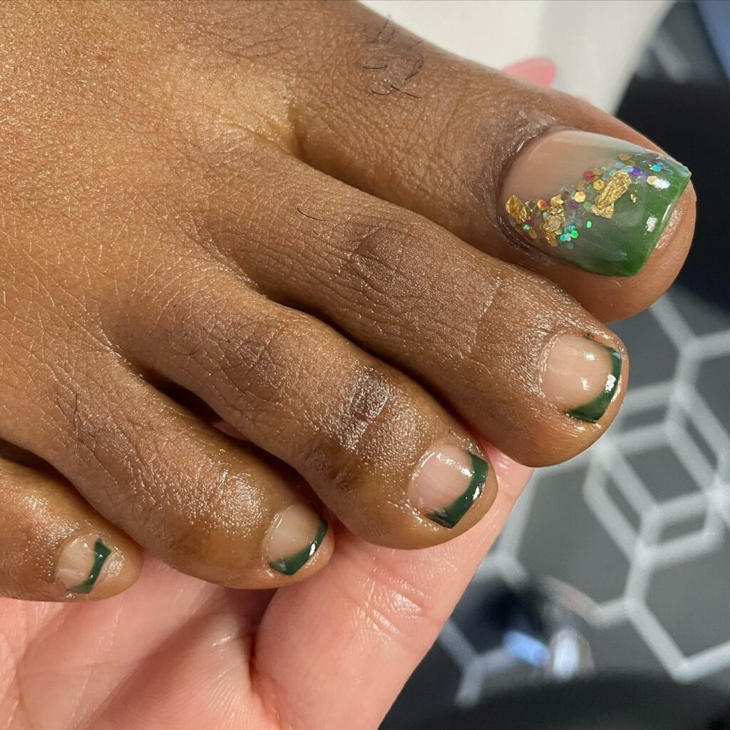 Gold Flakes On Green Tips Pedicure