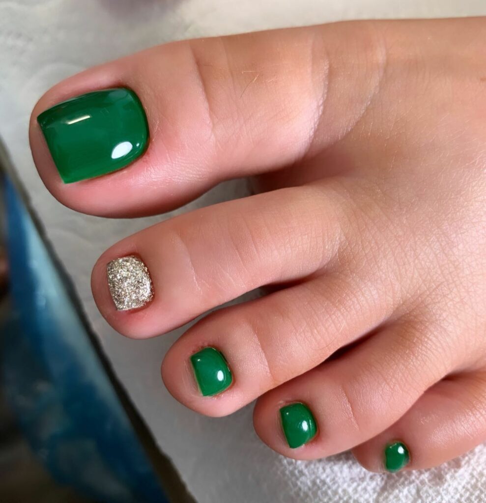 Dark Green Pedicure Kissed with Glitters