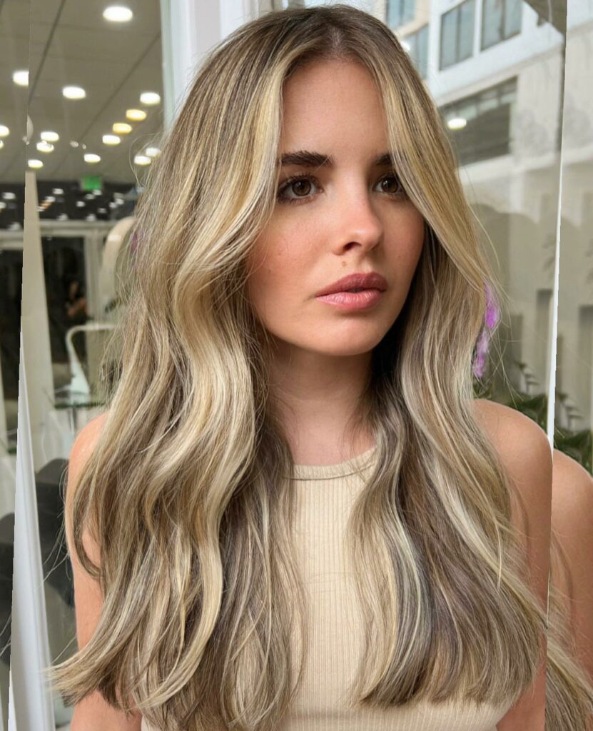 Sandy Blonde Hair with Long Curtain Bangs