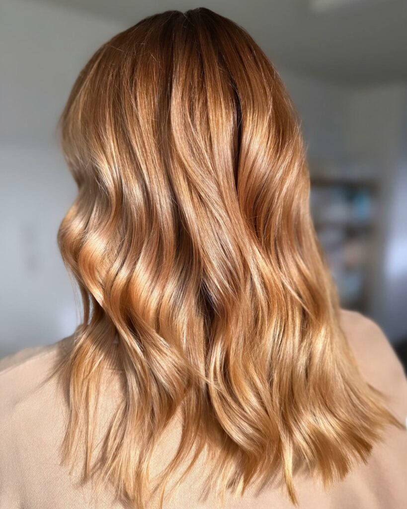 Creamy Copper Hair Color with Highlights