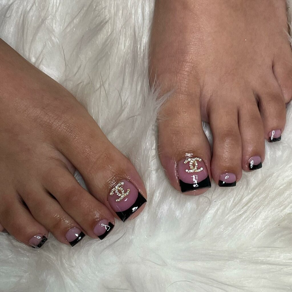 Black French Pedicure With ' Channel ' Logo