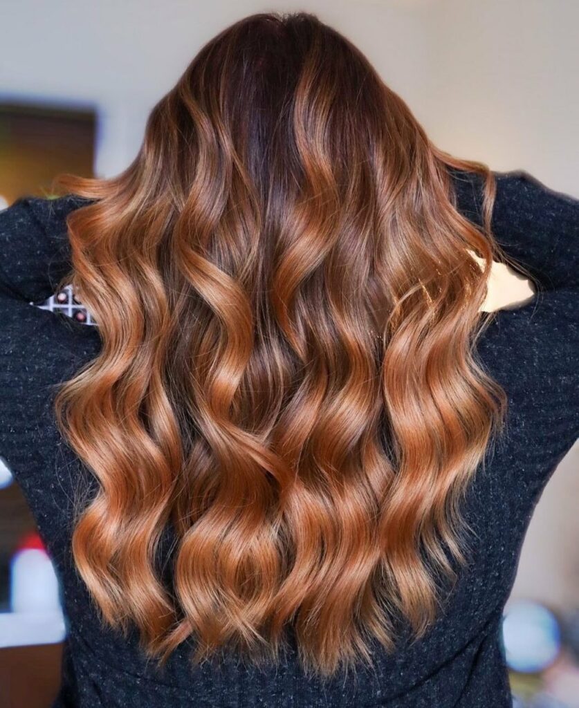 Apricot Highlights on Warm Brown Waves