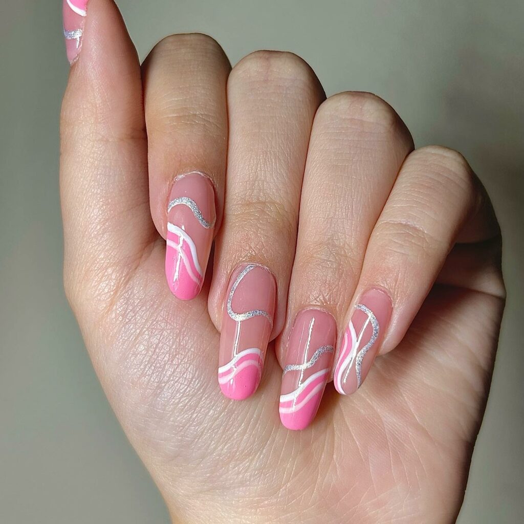 Round Nails With White And Pink Swirls