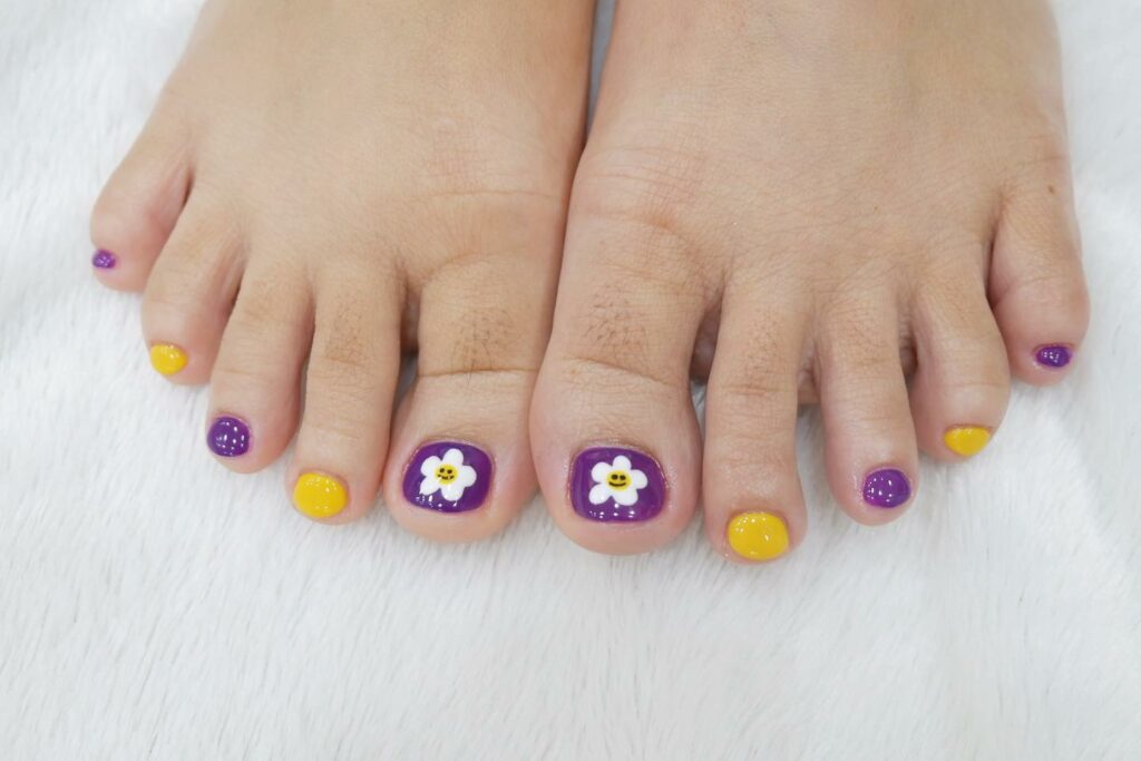  Purple and Yellow Toe Nails with Florals