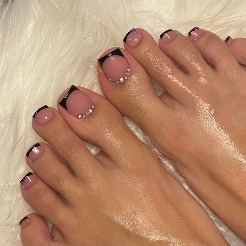 Black French Pedicure With A Couple Of Shiny Stones