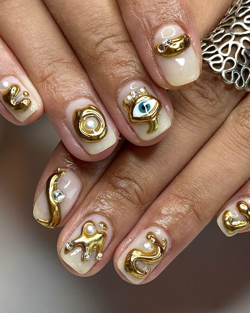 3D Accents Gold Nails