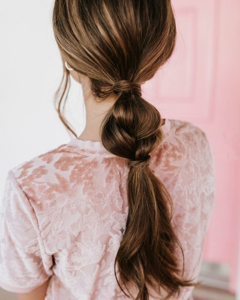 The Elegant Low Braid Ponytail