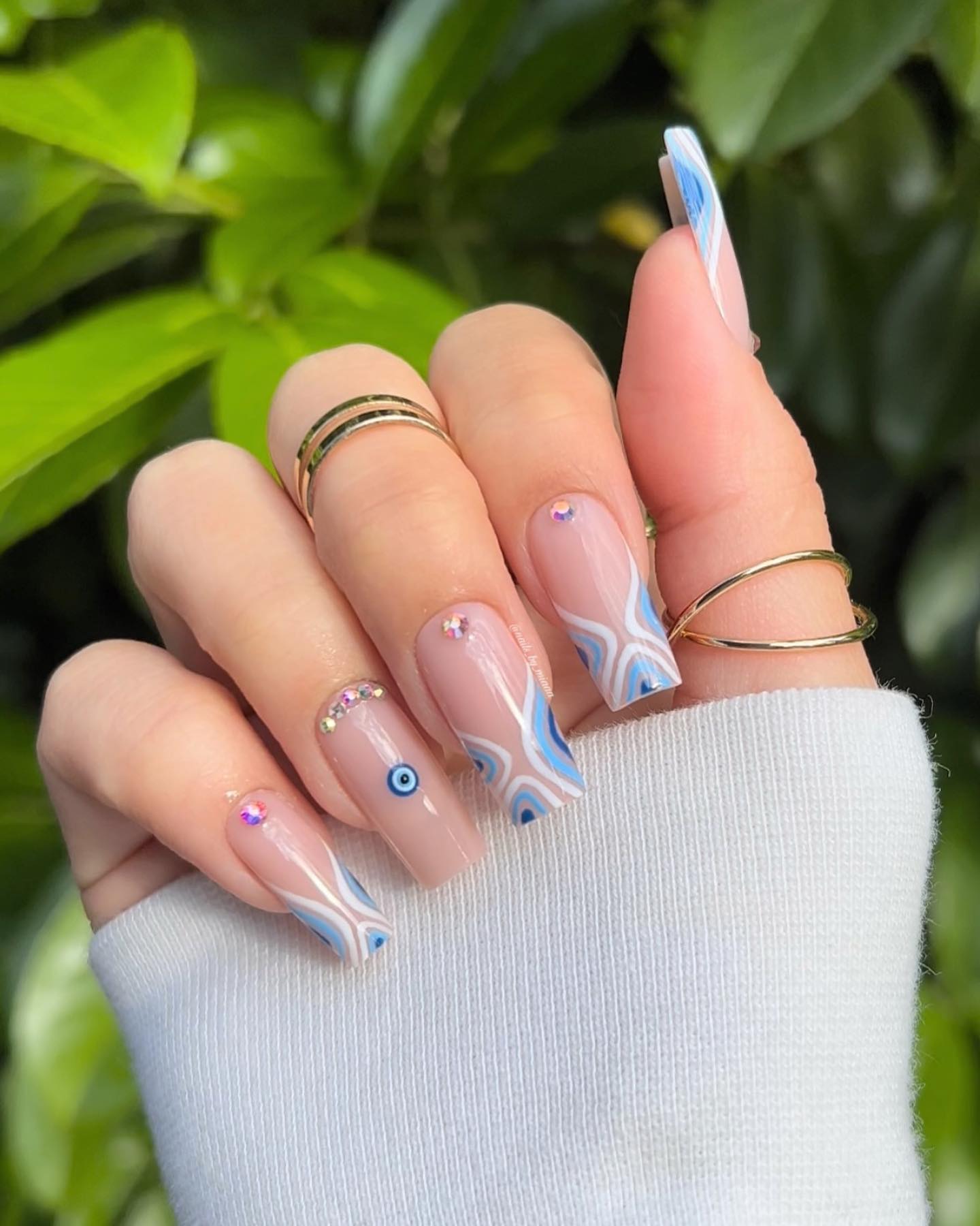 Channel Mystique with 20 EvilEye Nail Designs for 2024