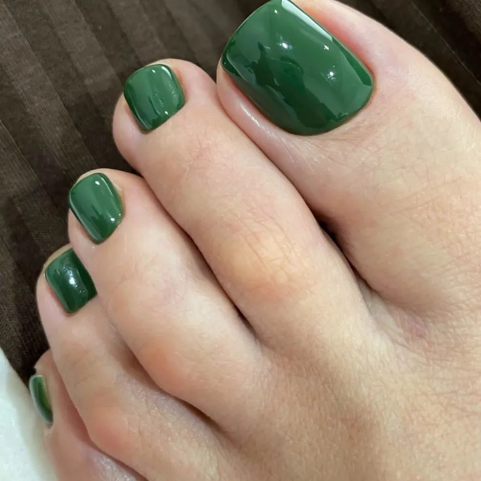 Dark Green Pedicure with Luxe Appeal
