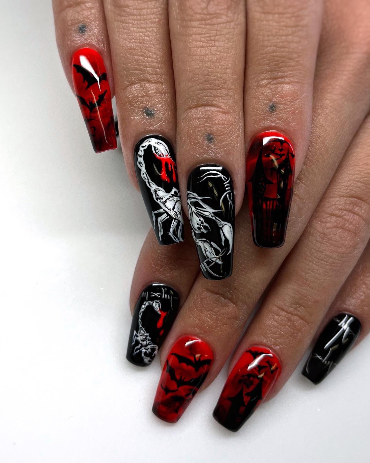 Go Bold with 50 Black and Red Nail Designs for 2024