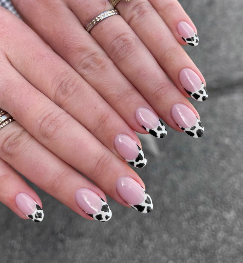 Cow Print Short French Nails with a Black Twist