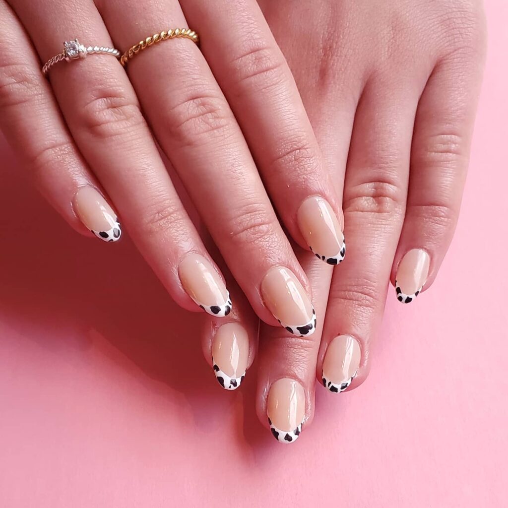 Cow Print on White Short French Nails