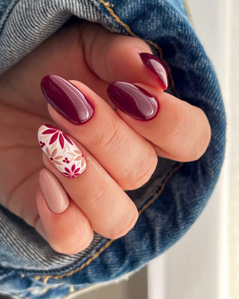 Maroon Nails with Floral Touch